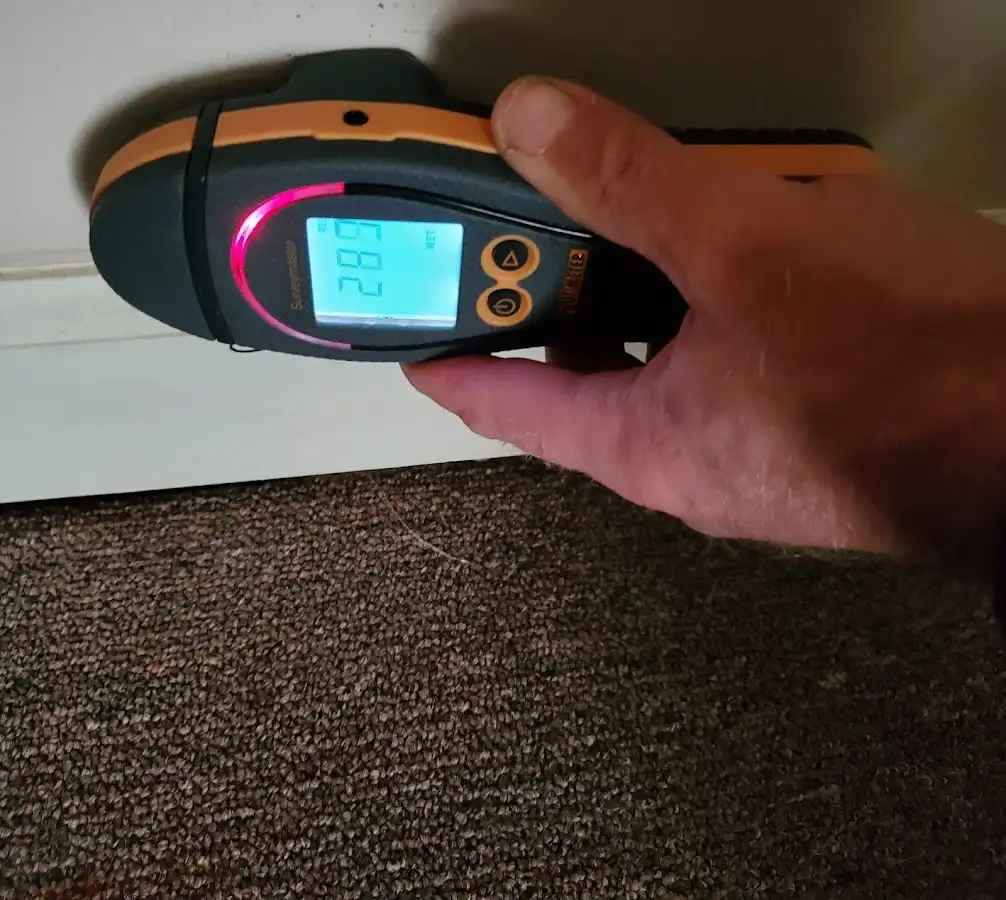 Moisture detection at baseboard during Sewage Cleanup & Sanitation in Walker Mill